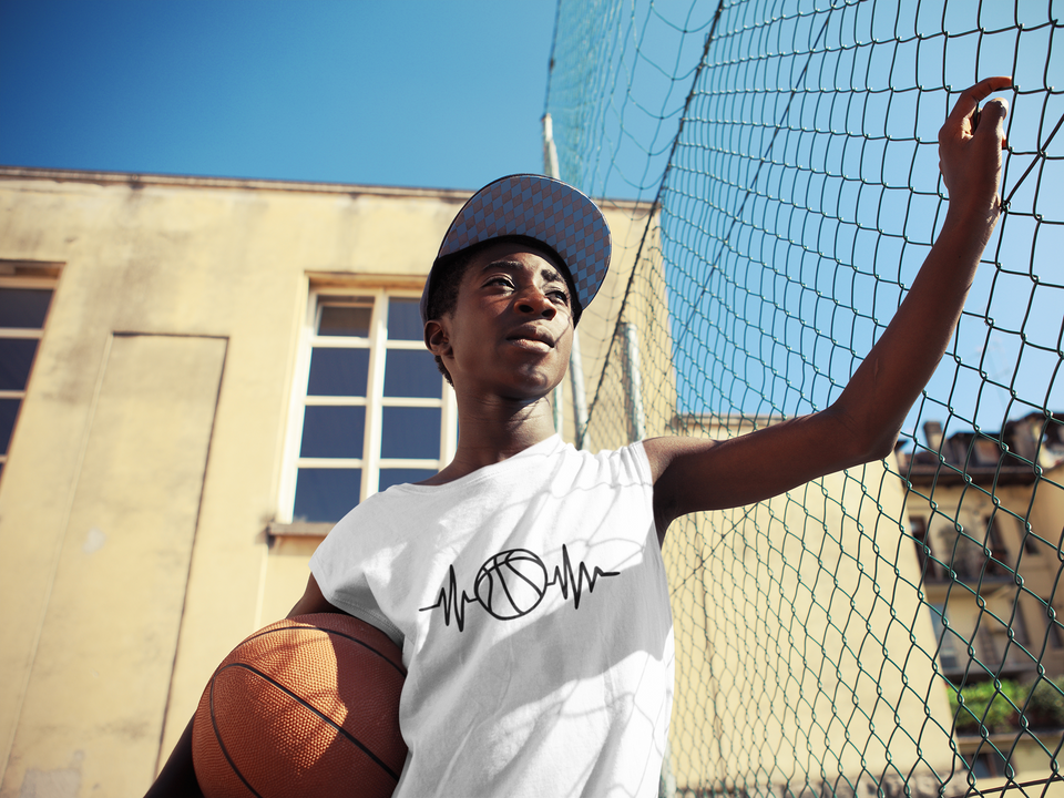 files/t-shirt-mockup-of-a-teenager-with-a-basketball-ball-35226-r-el2.png